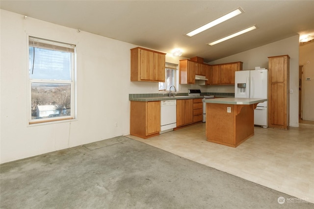 kitchen featuring a breakfast bar, white appliances, vaulted ceiling, sink, and a kitchen island