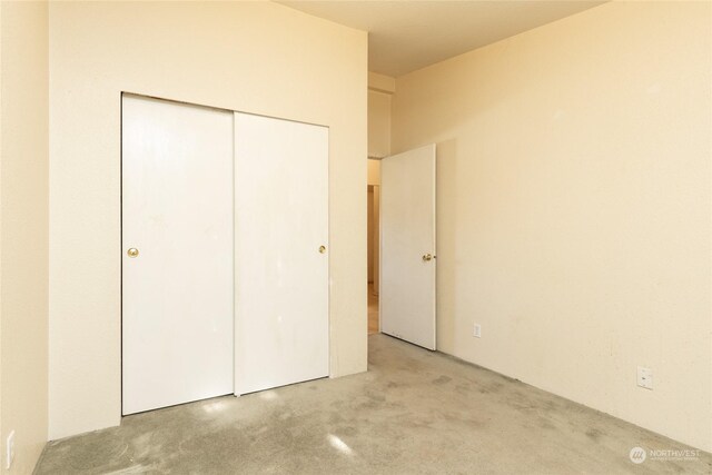 unfurnished bedroom featuring a closet