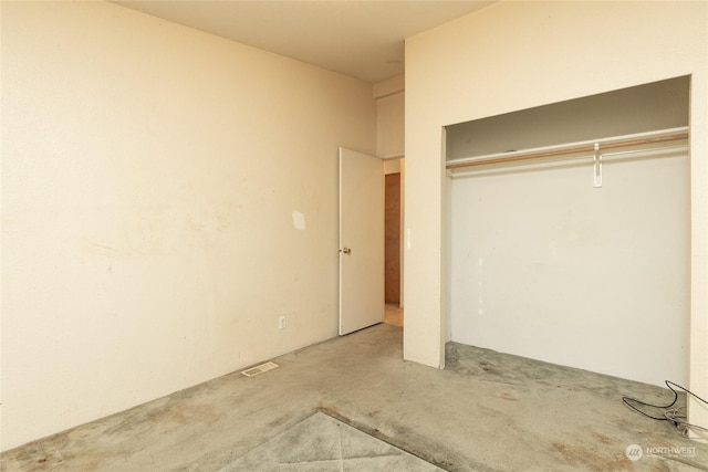 interior space with a closet and carpet