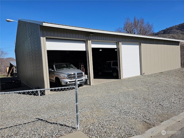 detached garage with fence