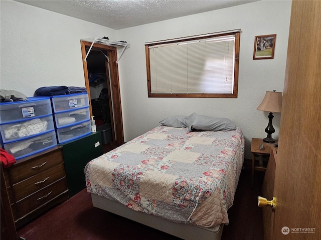 bedroom with a textured ceiling