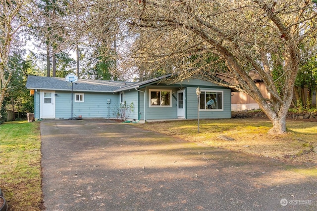 view of front of home with a front yard