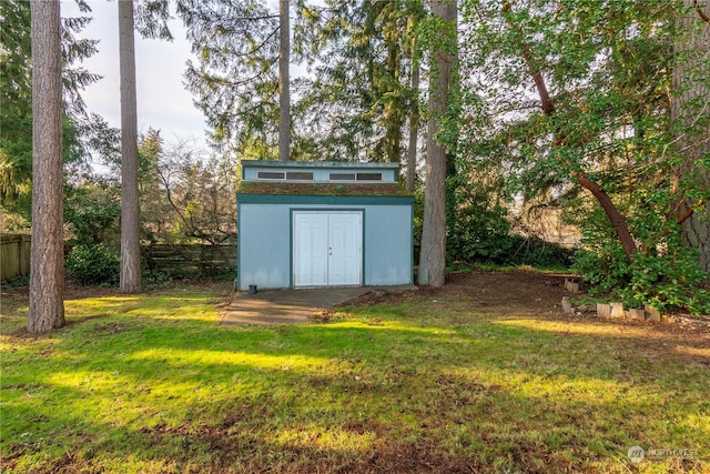 view of outdoor structure featuring a yard