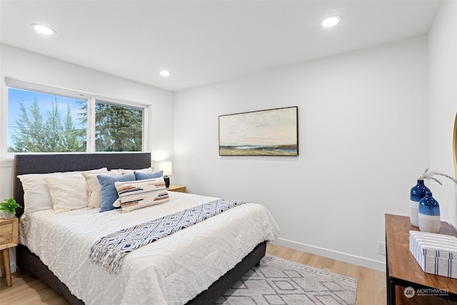 bedroom featuring light hardwood / wood-style flooring