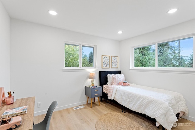 bedroom featuring light hardwood / wood-style flooring