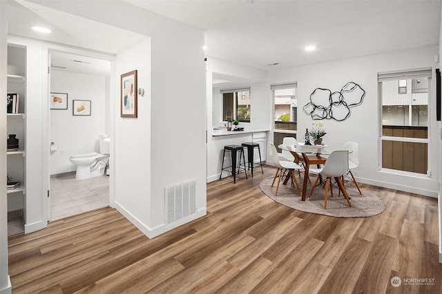 dining room featuring hardwood / wood-style flooring