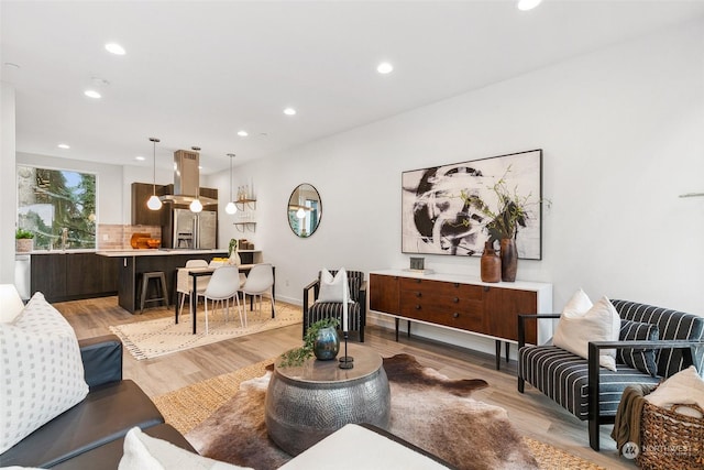 living room with light hardwood / wood-style floors