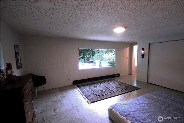 foyer entrance featuring baseboard heating