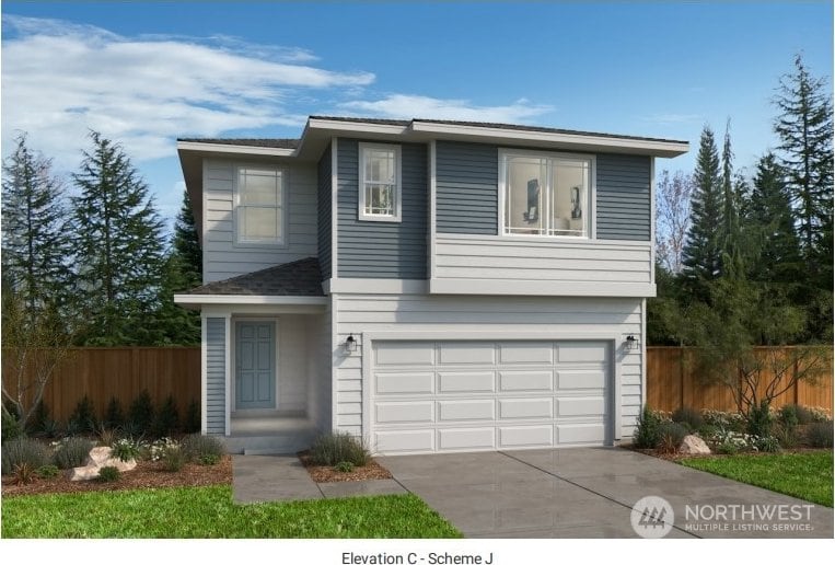 view of front property with a garage