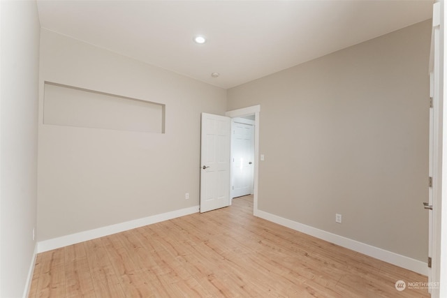 unfurnished bedroom with light hardwood / wood-style flooring