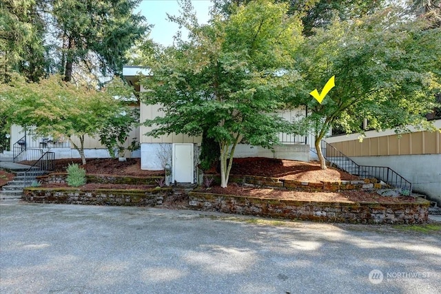 view of home's exterior featuring stairway