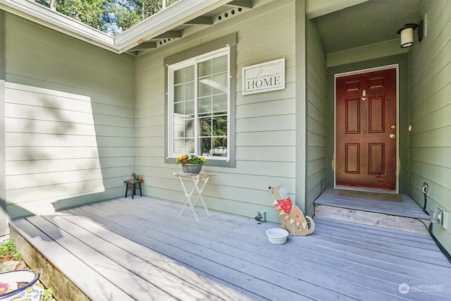 property entrance with covered porch