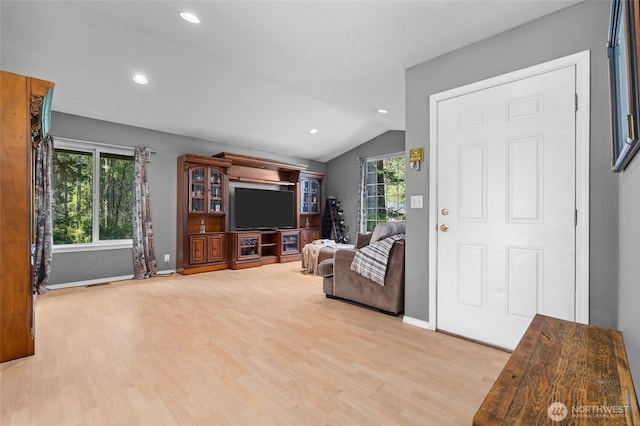 10405 Olympic Pl, Anderson Island, WA 98303 - living room with light wood-style flooring, baseboards, recessed lighting, and vaulted ceiling