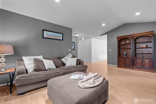 10405 Olympic Pl, Anderson Island, WA 98303 - living room with recessed lighting, vaulted ceiling, light wood-type flooring, and baseboards