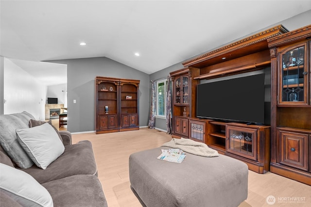 10405 Olympic Pl, Anderson Island, WA 98303 - living area featuring baseboards, vaulted ceiling, light wood-style floors, and recessed lighting