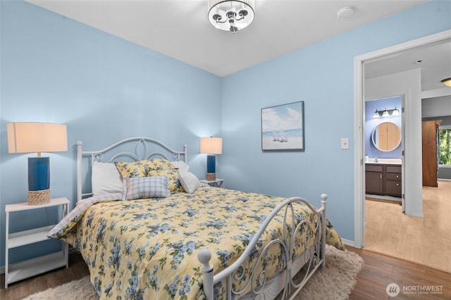 10405 Olympic Pl, Anderson Island, WA 98303 - bedroom with baseboards and wood finished floors