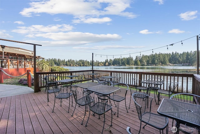 10405 Olympic Pl, Anderson Island, WA 98303 - wooden terrace with a water view and a wooded view