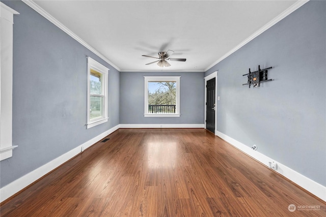 unfurnished room featuring ceiling fan, crown molding, and hardwood / wood-style floors