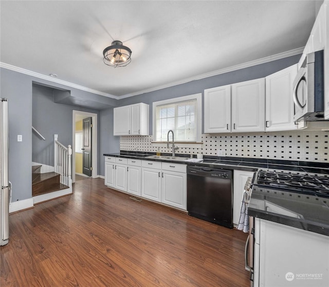 kitchen featuring dark hardwood / wood-style flooring, sink, white cabinets, black dishwasher, and decorative backsplash