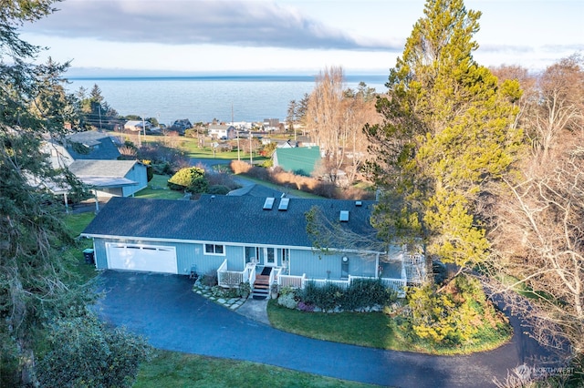 drone / aerial view featuring a water view