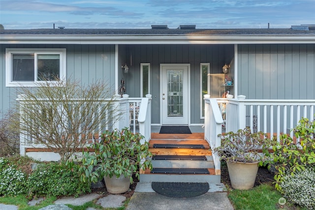 property entrance featuring covered porch