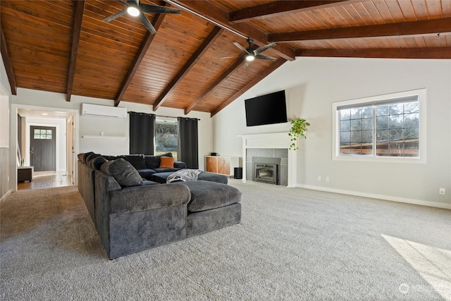 living room featuring ceiling fan, a fireplace, lofted ceiling with beams, and carpet flooring