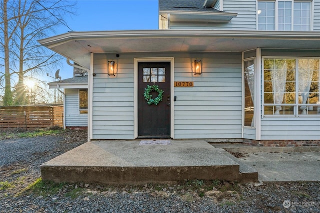 entrance to property with covered porch