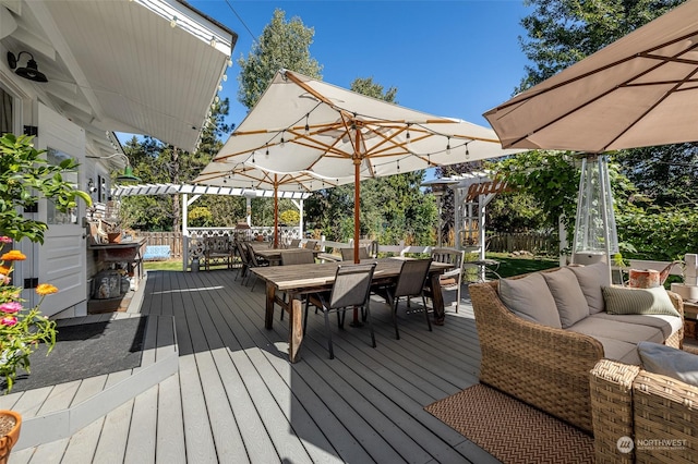 wooden deck with outdoor lounge area