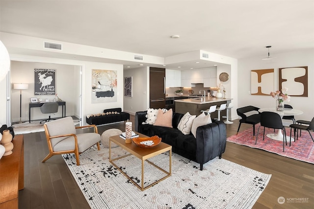 living room with light hardwood / wood-style floors