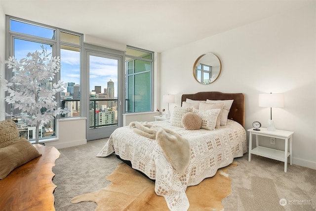 bedroom featuring light carpet