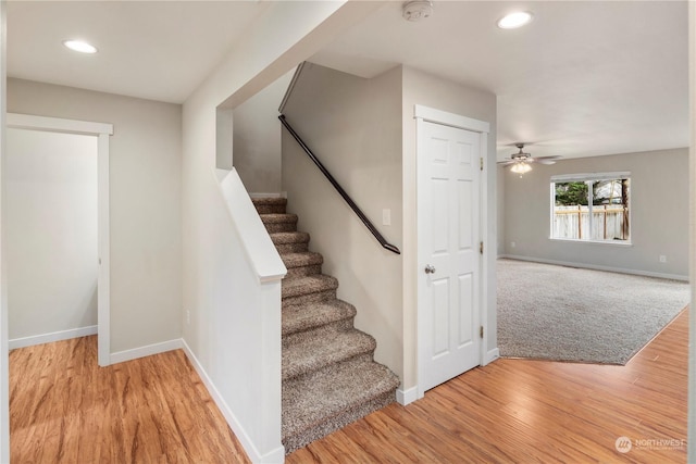 staircase featuring hardwood / wood-style flooring