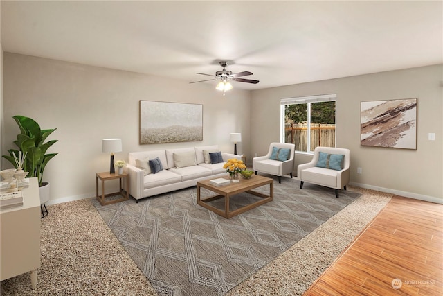 living room with ceiling fan and wood-type flooring