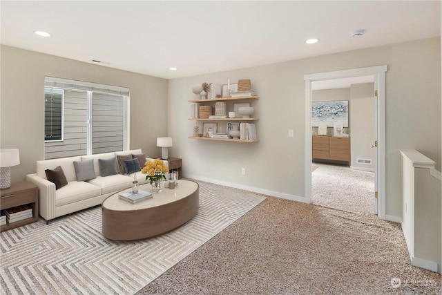 living room with light colored carpet