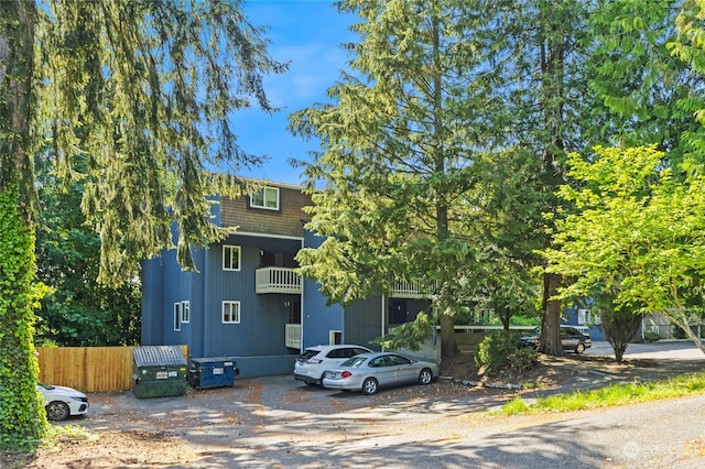 view of front of home with a balcony