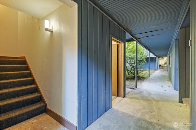 stairs with concrete floors