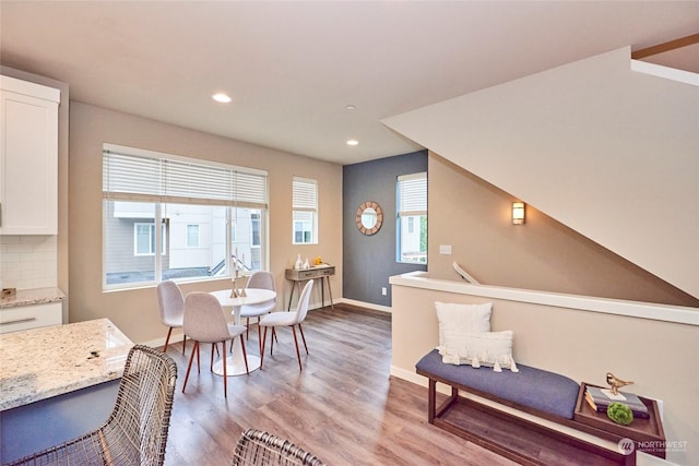 dining space featuring light wood-type flooring