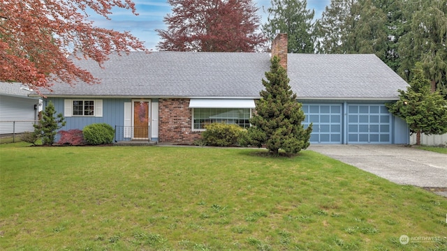 ranch-style home featuring a garage and a front lawn