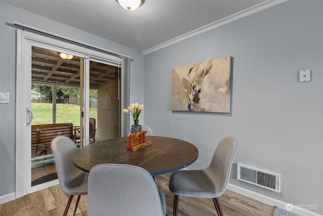 4626 143rd St E, Tacoma, WA 98446 - dining room featuring hardwood / wood-style floors and crown molding