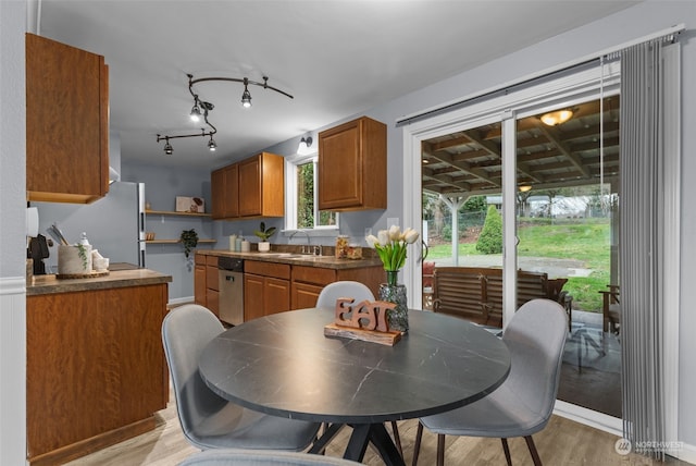 4626 143rd St E, Tacoma, WA 98446 - kitchen featuring light wood-type flooring, stainless steel appliances, and sink