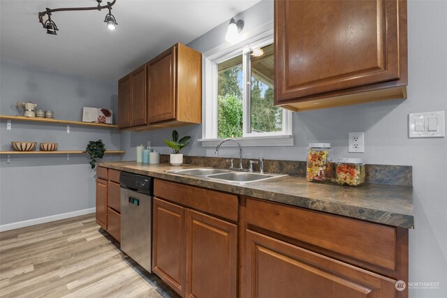 4626 143rd St E, Tacoma, WA 98446 - kitchen with sink, stainless steel dishwasher, and light hardwood / wood-style flooring
