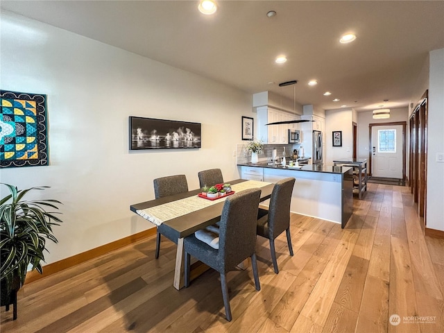 dining area featuring light hardwood / wood-style floors