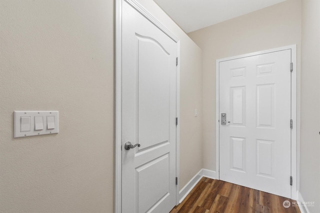 interior space with dark wood-type flooring