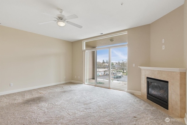 1548 River Rd Unit 209, Longview, WA 98632 - unfurnished living room with ceiling fan, light carpet, and a tiled fireplace