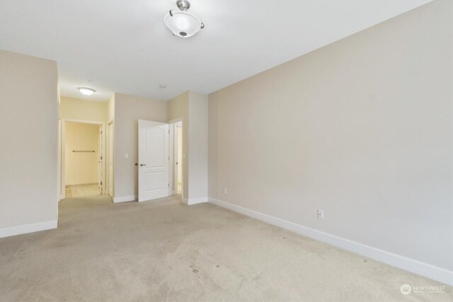 1548 River Rd Unit 209, Longview, WA 98632 - empty room featuring light colored carpet