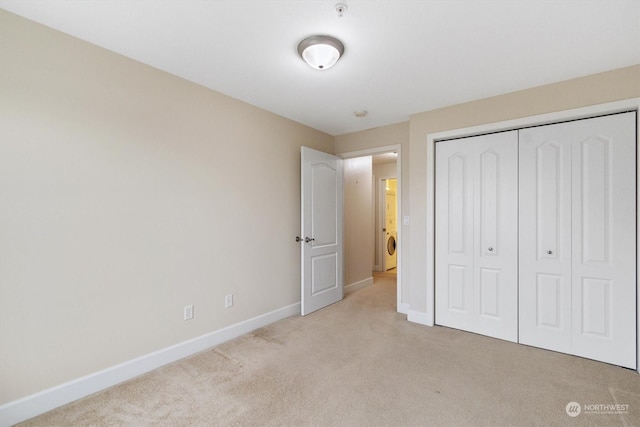 1548 River Rd Unit 209, Longview, WA 98632 - unfurnished bedroom featuring a closet and light colored carpet