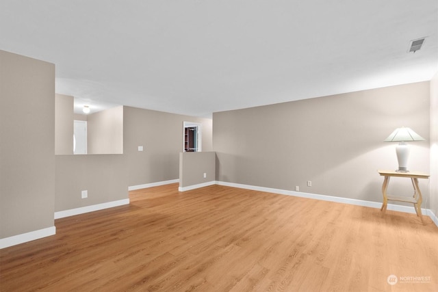 spare room with light wood-type flooring