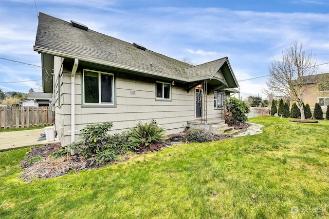 exterior space with a front lawn