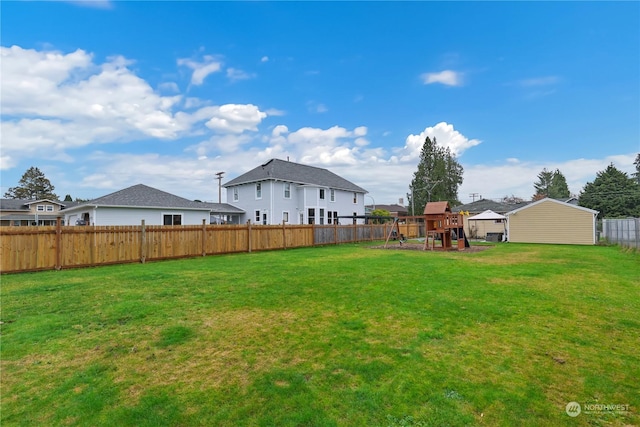 1207 W Pioneer, Puyallup, WA 98371 - view of yard featuring a playground