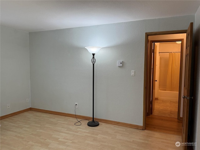 unfurnished room featuring light hardwood / wood-style flooring