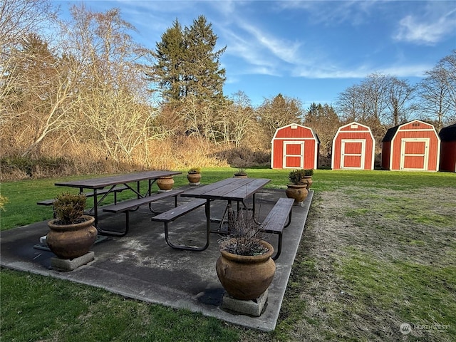 view of patio featuring a storage unit